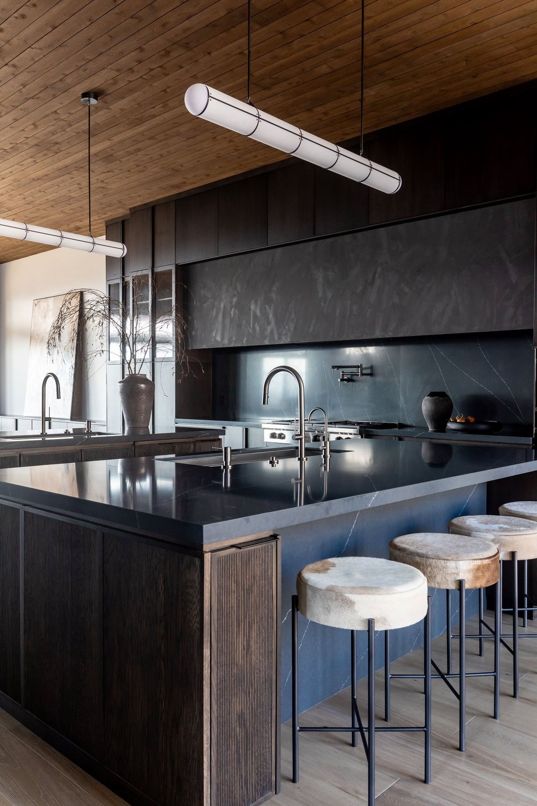 Hillside Reserve dark kitchen with two islands