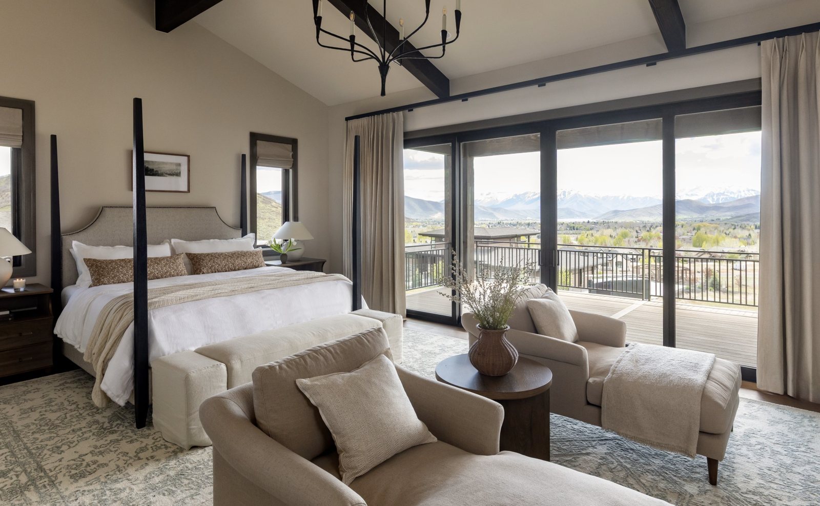 Mountainside primary bedroom with mountain views
